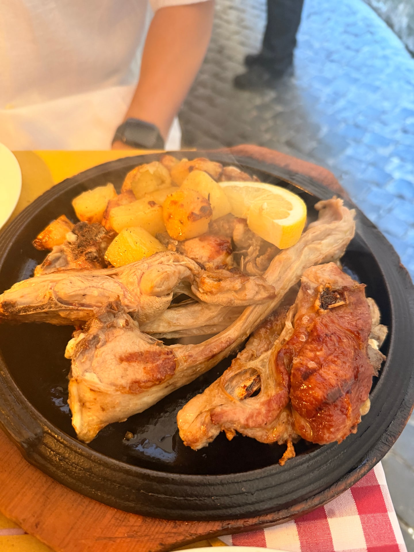 Grilled lamb chop with roasted potatoes at Achille Al Pantheon in Rome