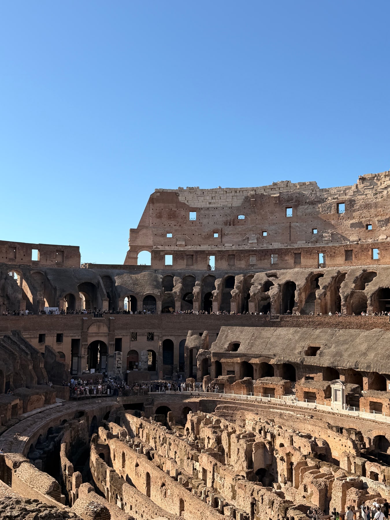 Tiered brick arches and seating levels inside the Colosseum