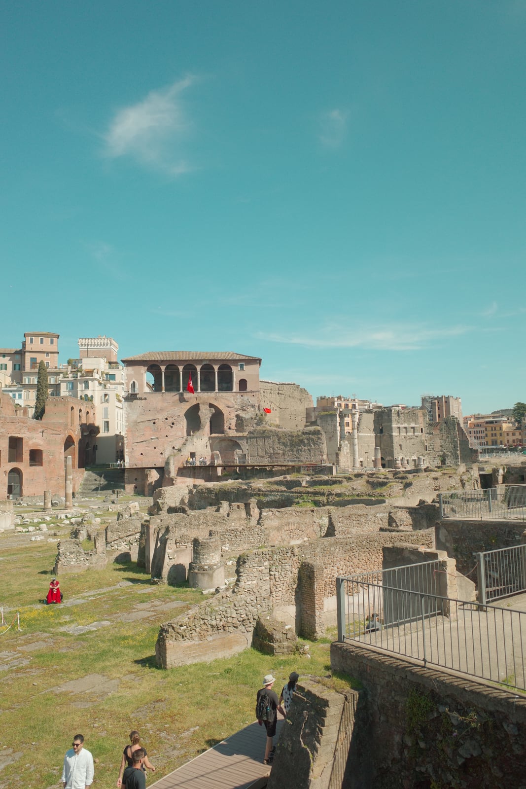 Visitors following the walking route through the Roman Forum ruins