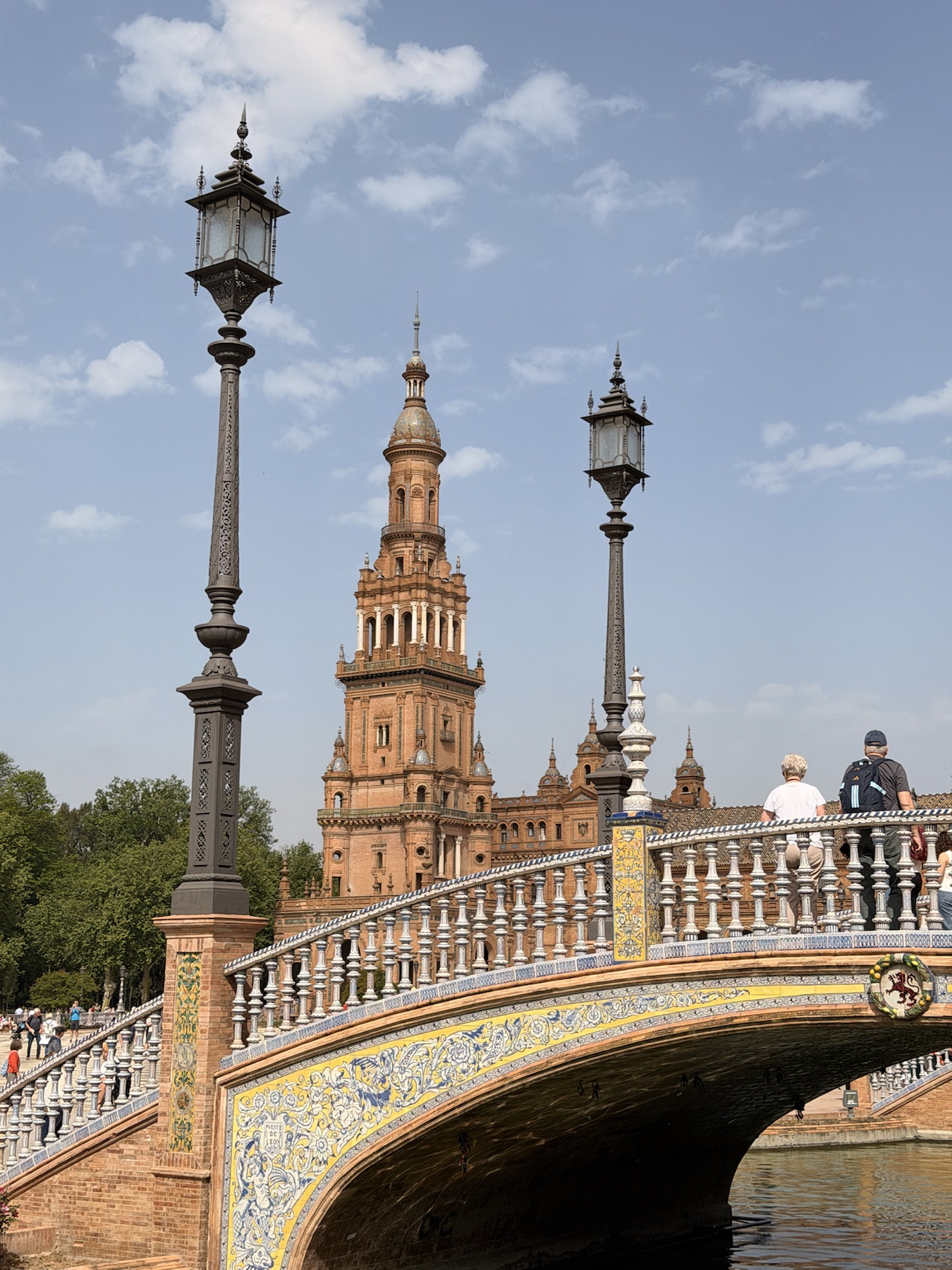 Tiled bridge and tower at Plaza de España in Seville