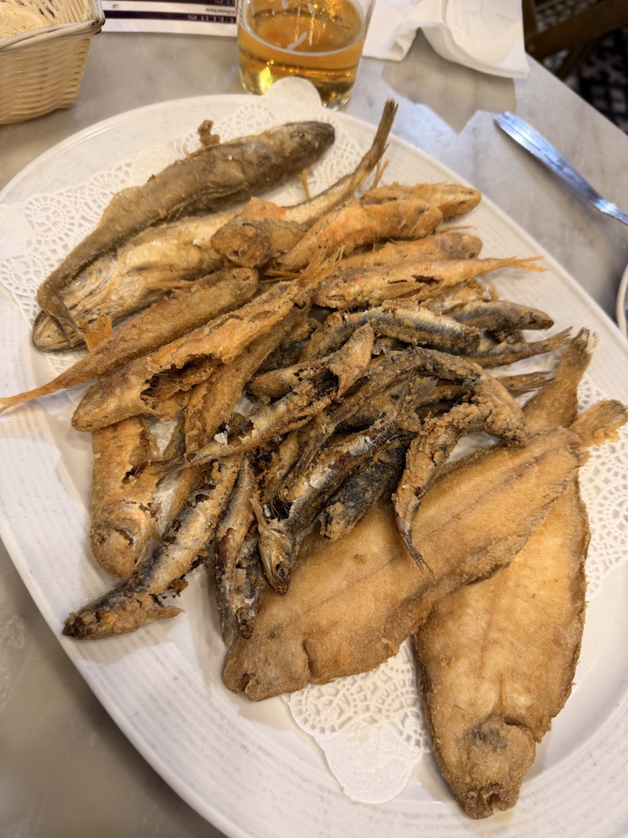 A plate of fried fish and seafood during a tapas crawl in Seville