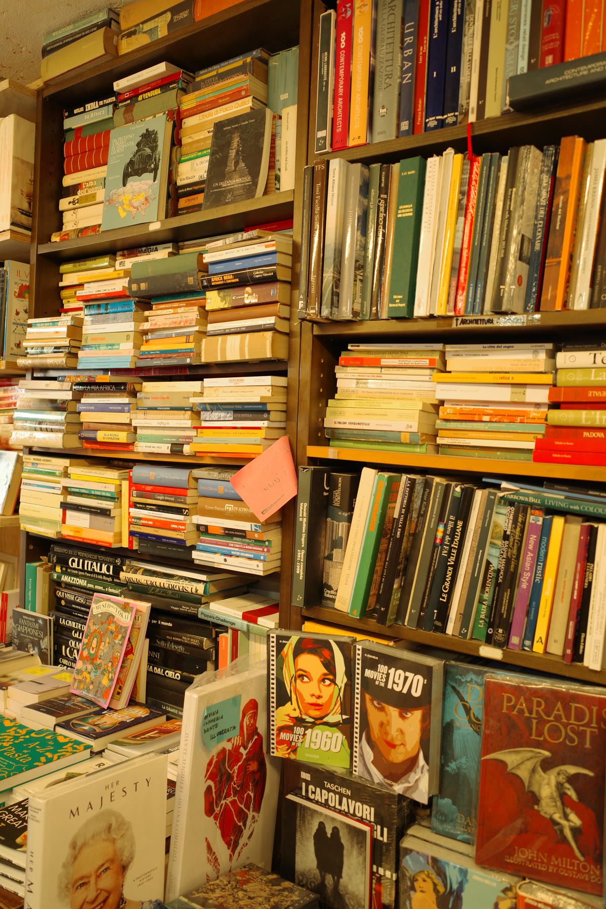 Tall stacks of books inside Libreria Acqua Alta in Venice